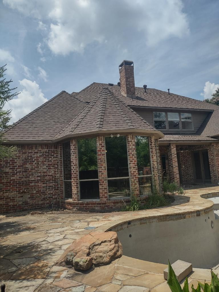 Completed roof on brick home DFW